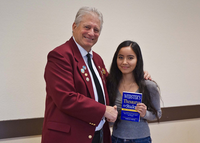 Left to right are Gary Grayson, Exalted ruler - Elks Lodge #6, Cecilia Michel, John F. Kennedy High School