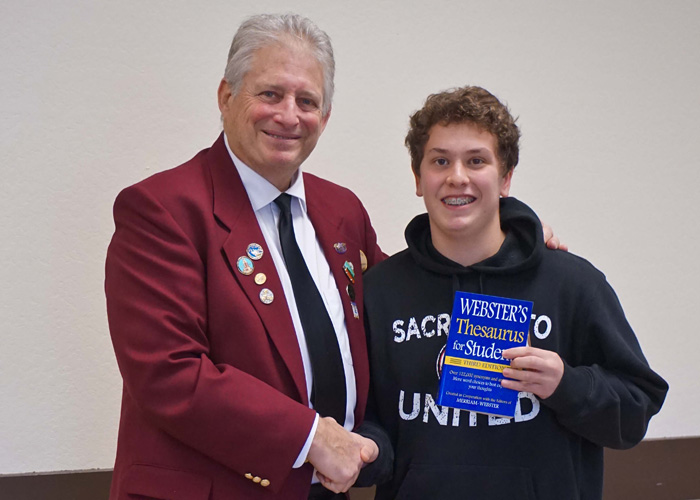 Left to right are Gary Grayson, Exalted ruler - Elks Lodge #6, Matthew Wildemann, Sam Brannan Middle School