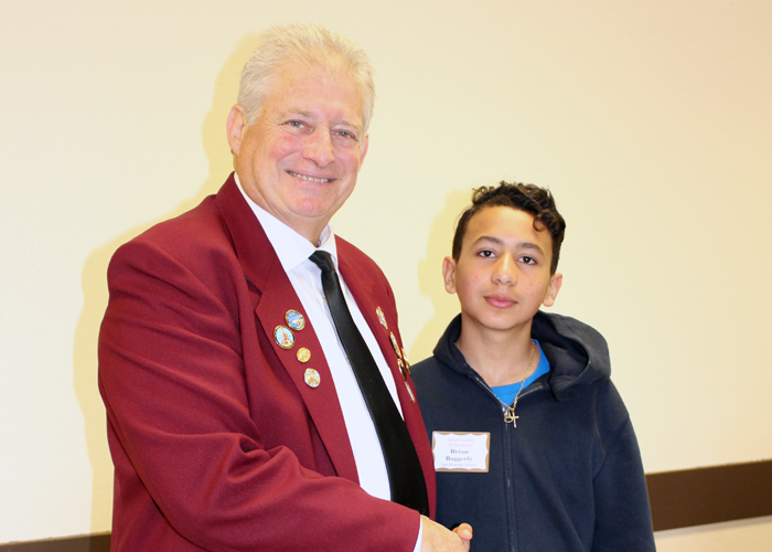 Left to right are Gary Grayson, Exalted ruler - Elks Lodge #6, Brian Baggerly Sam Brannan Middle School