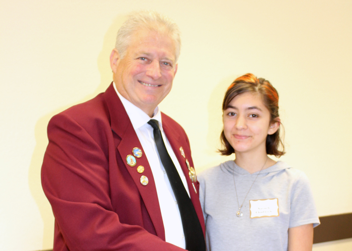 Left to right are Gary Grayson, Exalted ruler - Elks Lodge #6, Nevaeh Chadwick Sam Brannan Middle School