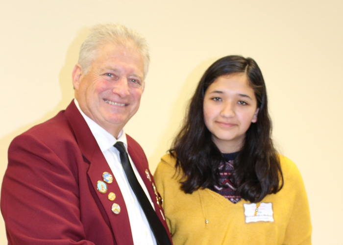Left to right are Gary Grayson, Exalted ruler - Elks Lodge #6, Eva Hernandez-Ochoa Will C. Wood Middle School
