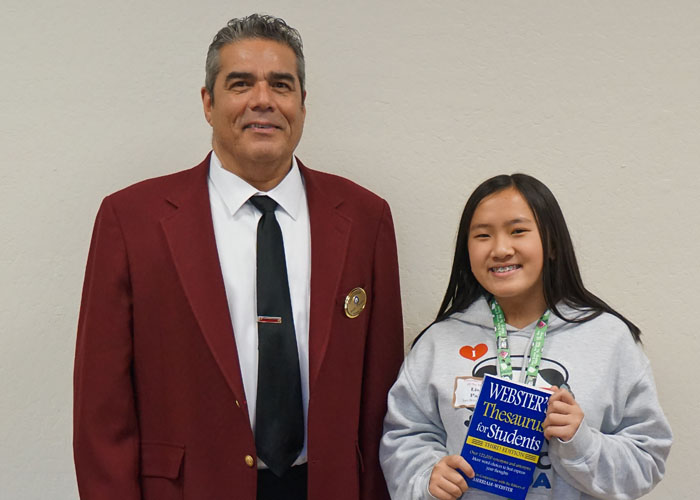 Left to right are Rudy Toralez, Elks 6 Leading Knight, Lisa Pan, Sam Brannan Middle School